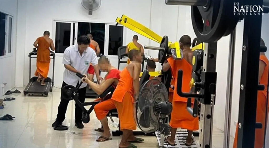 A photo of monks exercising in a gym