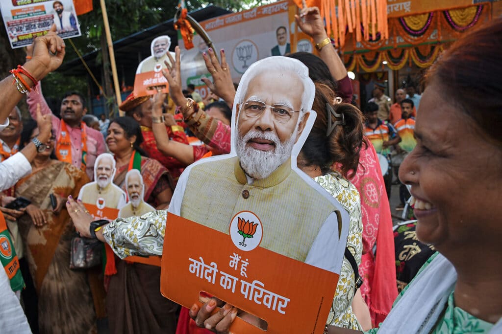 Supporters of Indian Prime Minister Narendra Modi hold