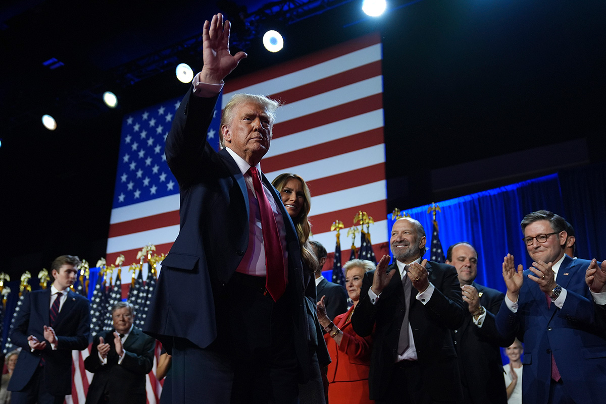 Donald Trump waving to supporters