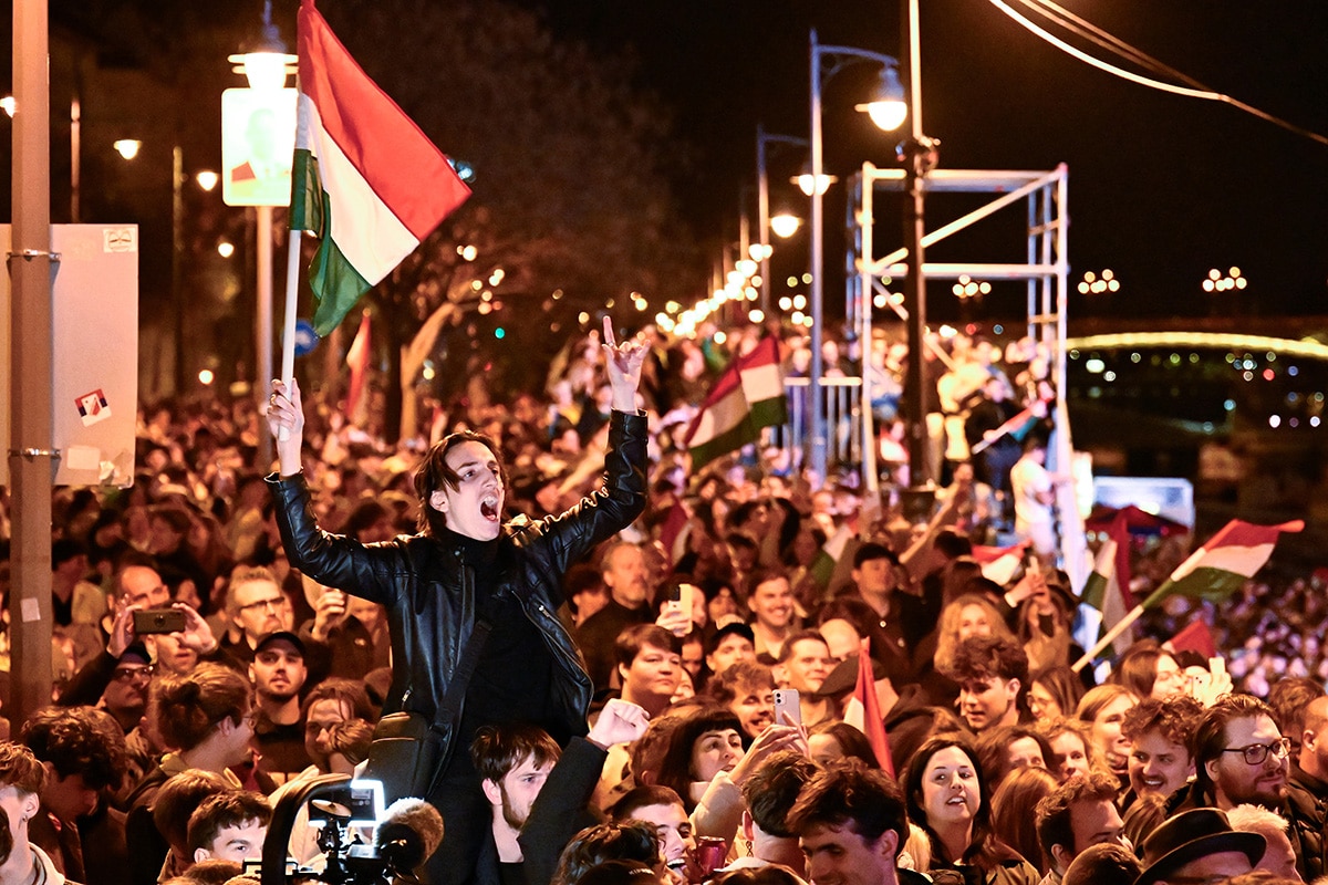 Celebrations broke out in the streets of Budapest after the Hungarian parliamentary election results were announced. | AP Photo / Denes Erdos
