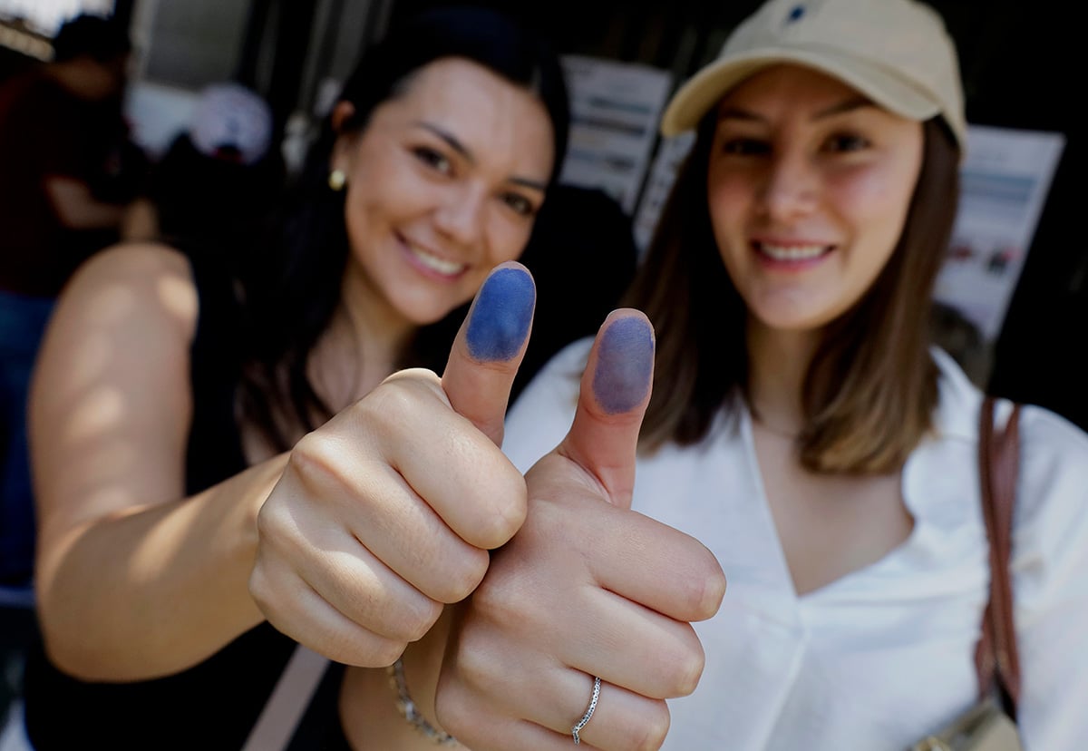 Residents and members of the Bolivian community in Mexico go to the Bolivian Embassy in Mexico City, Mexico, on August 17, 2025, to cast their votes in the Bolivian presidential elections. (Photo by Gerardo Vieyra/NurPhoto via AP)